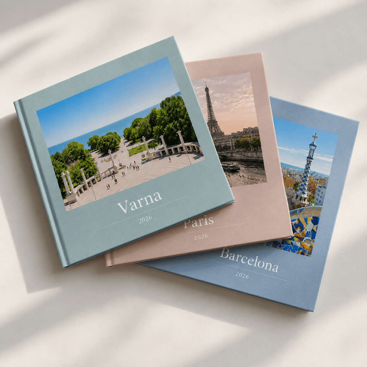 Memtach photobook held open in two hands to show the lay-flat spread